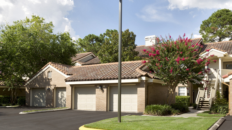 Private Garages with Remote Openers and Overhead Storage