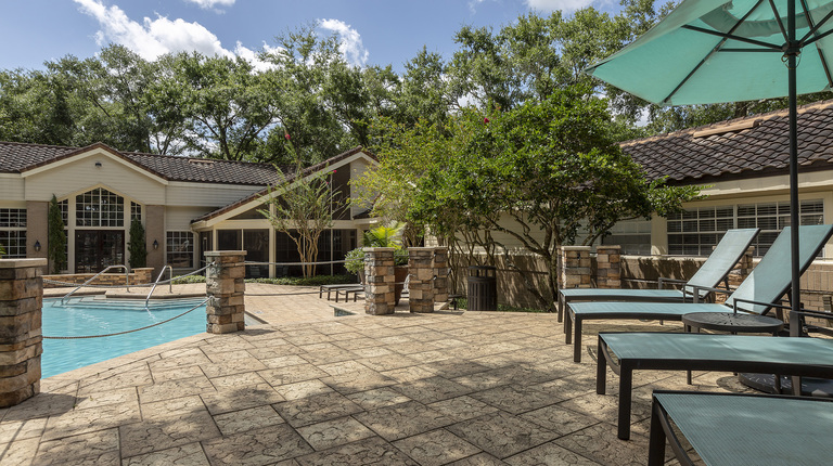 Resort-Inspired Pool with Sundeck and Lounge Seating