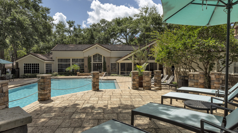 Resort-Inspired Pool with Sundeck and Lounge Seating